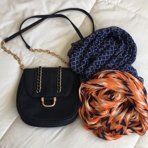 Navy Blue Satchel with gold Detail and scarves.
